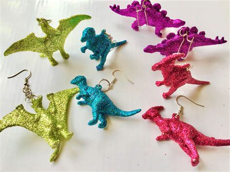 All earwires are hypoallergenic stai. . Dinosaur earrings
